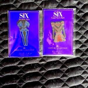 Bag pins from the Broadway show "Six"